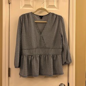 Ann Taylor Black and ivory print blouse. Gently worn. Like new